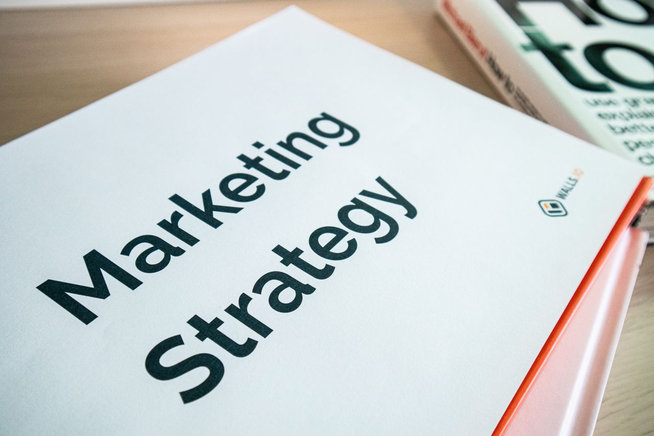 About Close-up of a marketing strategy document on a desk, ideal for business content.